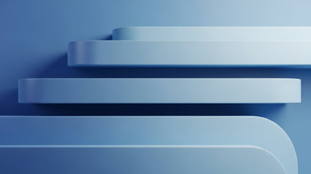 Several smooth, rounded light blue shelves or platforms are arranged in a stepped configuration against a solid, uniform blue background.の素材