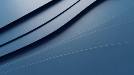 A deep blue abstract background featuring smooth, curved waves with subtle, thin white lines and soft shadows creating a sense of depth and flow.の素材