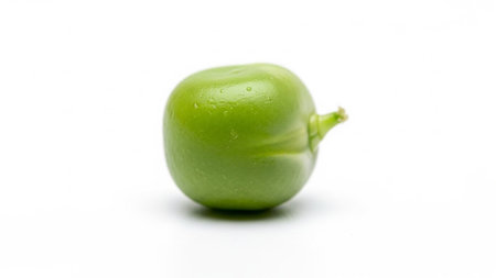 Droplets showing single green pea pod seed with water droplets isolated on a white background with soft shadow. resolutionの素材