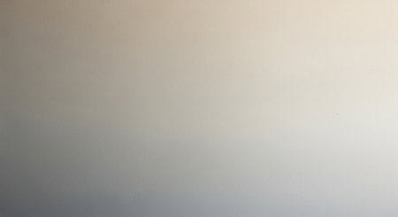 Wall showing smooth gradient background transitioning from light beige to soft gray with subtle texture and soft lighting keywords: background,...の素材