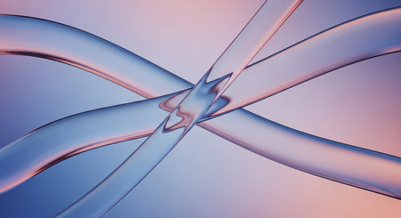 Two smooth translucent ribbons intersect and flow in gentle curves of blue and pink against a soft gradient backdrop creating a serene abstract...の素材