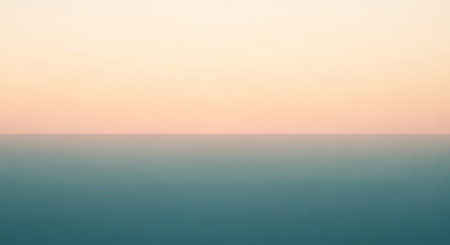 A minimalist horizon with a soft peach sky gradient above a teal water gradient. Clear details and vibrant col...の素材