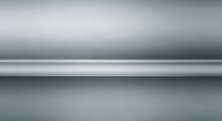A smooth metallic horizontal shelf with a subtle gradient background and soft lighting.の素材