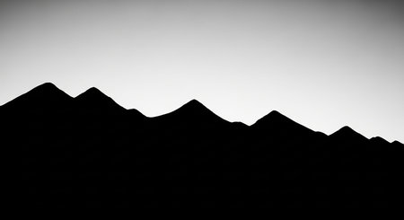 Horizon showing stark black mountain range silhouette against a gradient sky with subtle light and shadow transitions keywords: mountain, mountains,...の素材