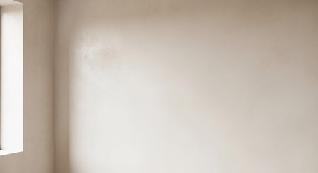 Empty room with a window casting soft light on a textured wall Clear details and vibrant colors enhance visual...の素材