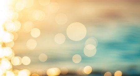 Pattern showing bokeh effect with warm golden yellow and soft teal blue blurred lights and out of focus background keywords: bokeh, lights, blurred,...の素材