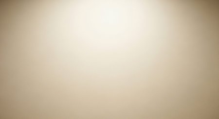Copy showing warm beige textured background with soft spotlight and subtle grain keywords: background, beige,...の素材