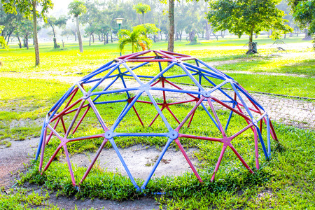 playground park on grass near school is childrenの写真素材