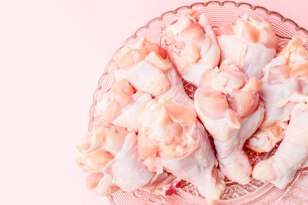 raw chickens on plateの写真素材