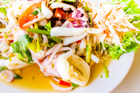 steam squid eggs salad with spicy lemon juice soup, samui thailandの写真素材