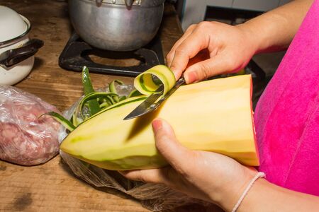 peeled papaya for recipe for green papaya saladの写真素材