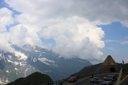 Mountain road in the Swiss Alps. View from the car.の写真素材