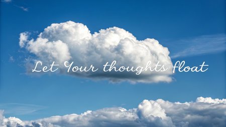 Puffy white cumulus clouds drift lazily against a vibrant blue sky, creating a beautiful and dreamy landscape, perfect for representing peace and freedom.の素材