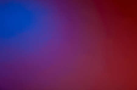 Red blue background background in the photographic studioの写真素材