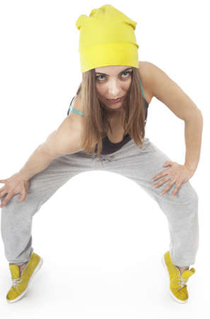 Young woman doing sport exercises  On a white backgroundの写真素材