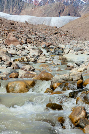 ice stream flowing from the glaciers of the mountain systemの写真素材