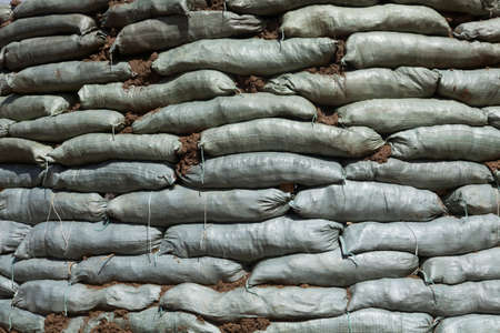 Sandbags for flood protection. Temporary damの写真素材