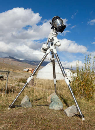 A single lens reflex camera mounted on a tripod.の写真素材