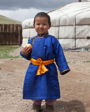Mongolian boy in traditional national dressの写真素材