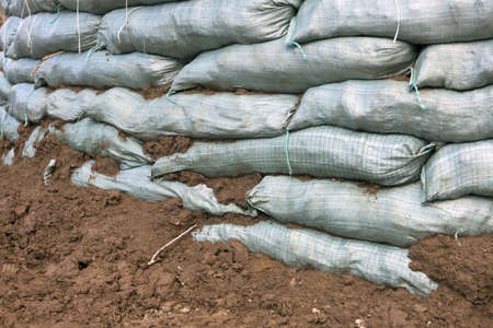 Sandbags for flood protection. Temporary damの写真素材