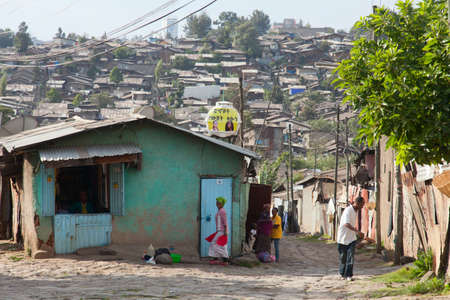 ETHIOPIA ADDIS ABABA,DECEMBER 12,2013. People on the street in Addis Ababa Decemder 12,2013.のeditorial素材