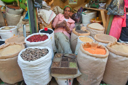 ETHIOPIA ADDIS ABABA,DECEMDER 27,2013.Seller of spices. Merkato market in Ethiopia,Addis Ababa, December 27,2013のeditorial素材