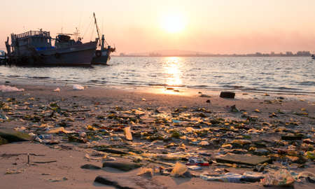 Spontaneous garbage dump on a beach in Indochinaの写真素材