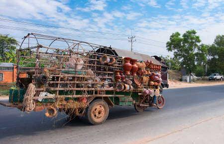 SIAM REAP, CAMBODIA - JANUARY 2015: Mobile shop for the sale of ceramic products in Cambodia, January 2015のeditorial素材