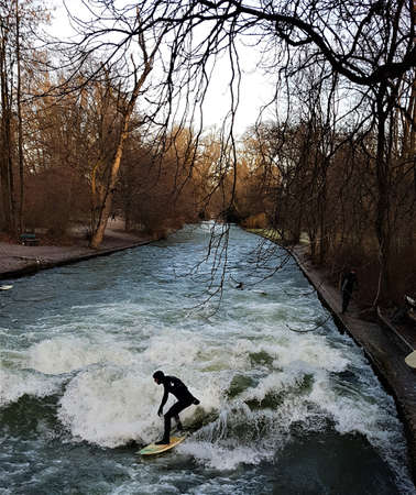 Surfer Riding The Artificial Wave On The Eisの写真素材