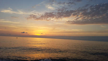 sunset on beach in batumiの写真素材