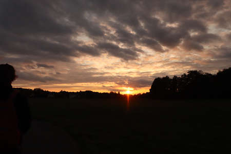 beautiful sunset in cloudy autumnの写真素材
