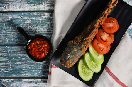 Fried catfish with rice, Indonesian dishの写真素材