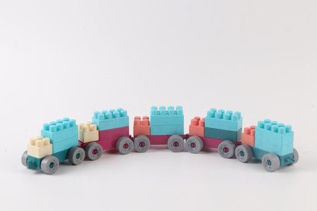 Plastic toy train on white background, closeup of photo.の写真素材