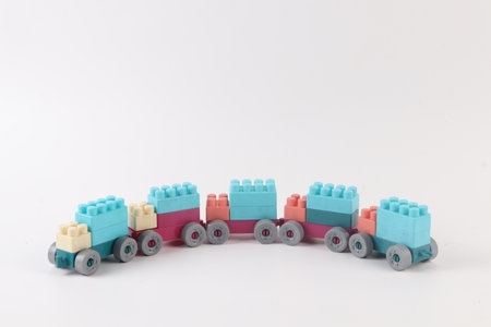 Plastic toy train on white background with copy space for text.の写真素材
