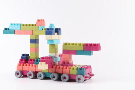 Plastic building blocks isolated on white background. Colorful toy bricksの写真素材