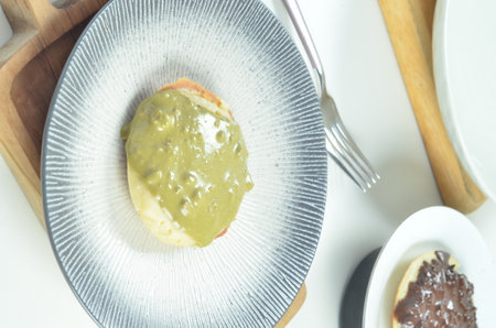 Serabi the indonesian traditional pancake made from coconut milk with macha toppint.