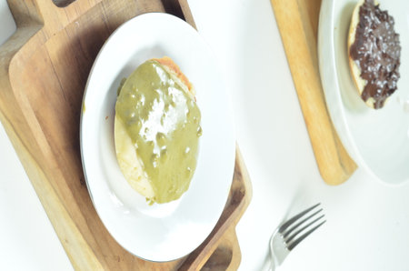Serabi the indonesian traditional pancake made from coconut milk with macha toppint.の写真素材