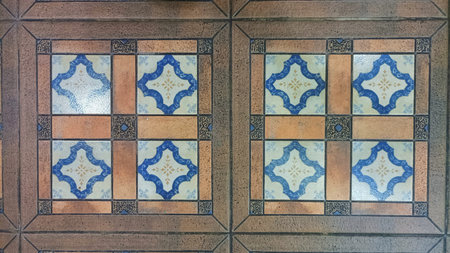 Vintage Mediterranean-style floor tiles with blue and white geometric patterns. Symmetrical retro...