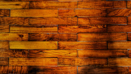 Natural Brown Polished Wood Parquet Texture Background with Elegant Grain Patterns and Glossy Finish for Interior Design and Flooringの写真素材