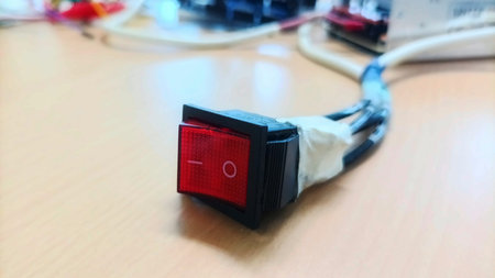 Close-up of a Manual Toggle Power Switch Under Development and Design Phase on an Electronics...