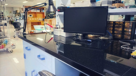 Close-up Perspective of a Clean and Organized Workbench Surface in a High-Tech Electronics...