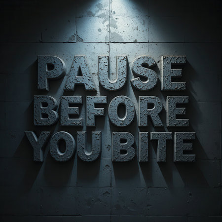 This striking image features the phrase "Pause Before You Bite" on a textured concrete wall. The dramatic lighting emphasizes the powerful message, evoking thought and reflection.の素材