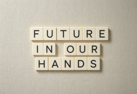 Inspiring concept of the phrase "Future in Our Hands" using letter tiles on textured background, symbolizing empowerment, hope, and the importance of personal responsibility for future success.の素材