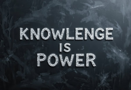 This image features the empowering quote "Knowledge is Power" displayed on a textured chalkboard background, symbolizing education and inspiration in a modern design.の素材
