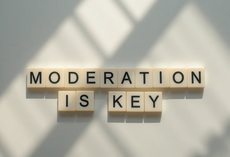 This image showcases the message "Moderation is Key" using letter tiles against a serene background. It symbolizes balance and mindfulness in everyday life.の素材
