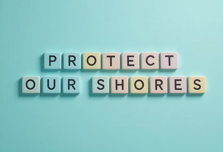Colorful letter tiles spell out "Protect Our Shores," emphasizing the importance of coastal conservation. Perfect for environmental campaigns and awareness efforts.の素材