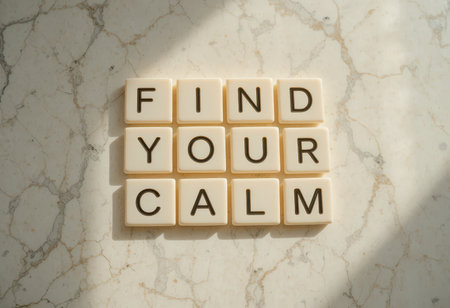 A serene image showcasing the phrase "Find Your Calm" arranged on a light marble surface, perfect for promoting mindfulness and relaxation themes in various projects.の素材
