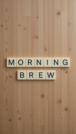A charming display of the words "Morning Brew" arranged with letters on a wooden surface, creating a cozy and inviting atmosphere for coffee lovers. Perfect for lifestyle and beverage themes.の素材