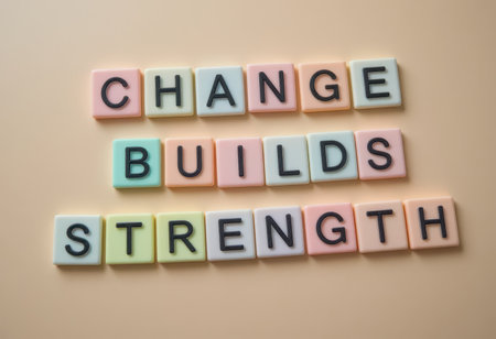 Captivating arrangement of letters forming an inspirational quote about change and strength, set against a soft pastel background, ideal for motivational themes.の素材