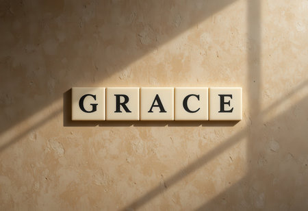This image showcases letter blocks spelling the word "grace" against a textured wall, illuminated by soft sunlight. It evokes a sense of tranquility and elegance, perfect for inspiring dの素材
